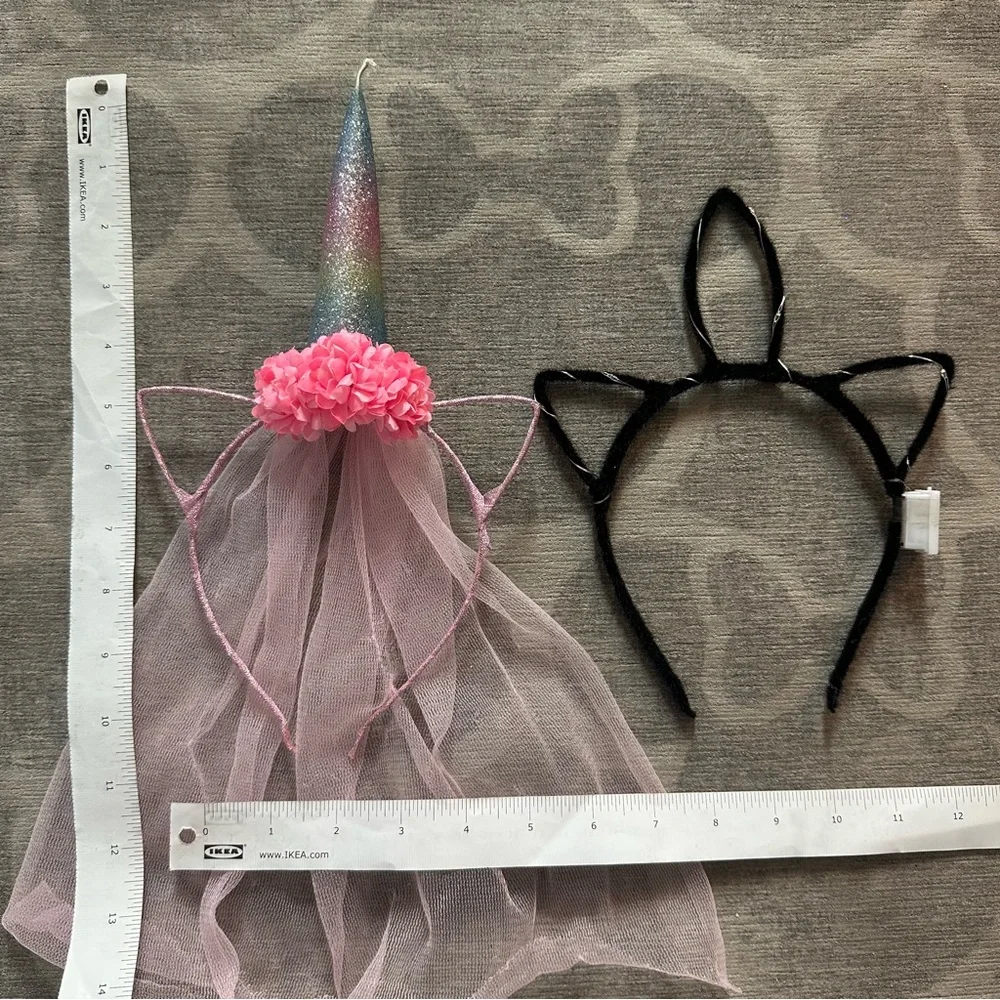 2 Unicorn hairbands. 1 with a veil the other lights up